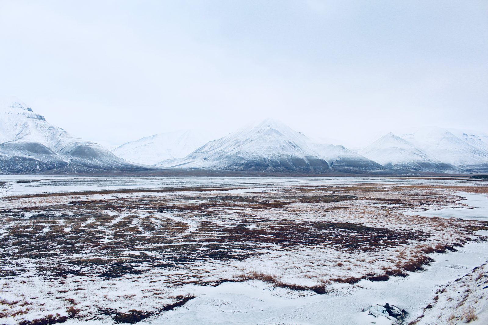 Snow-covered tundra and mountains